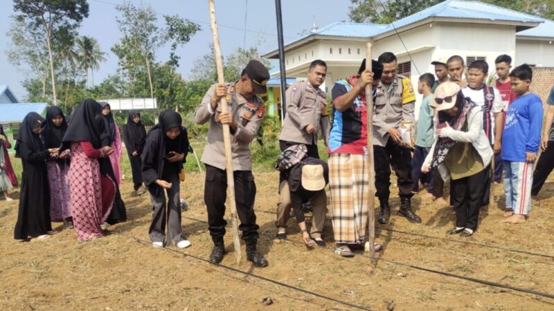 Manfaatkan Lahan Ponpes, Polsek Purwodadi Polres Musi Rawas Bersinergi Ponpes Daarul Huffadz An-Nahdliyah Tanam Jagung 
