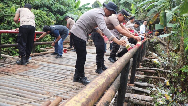 Sukseskan Program BELIDA, Polres Musi Rawas Perbaiki Jembatan Sungai Use Desa Pulau Panggung